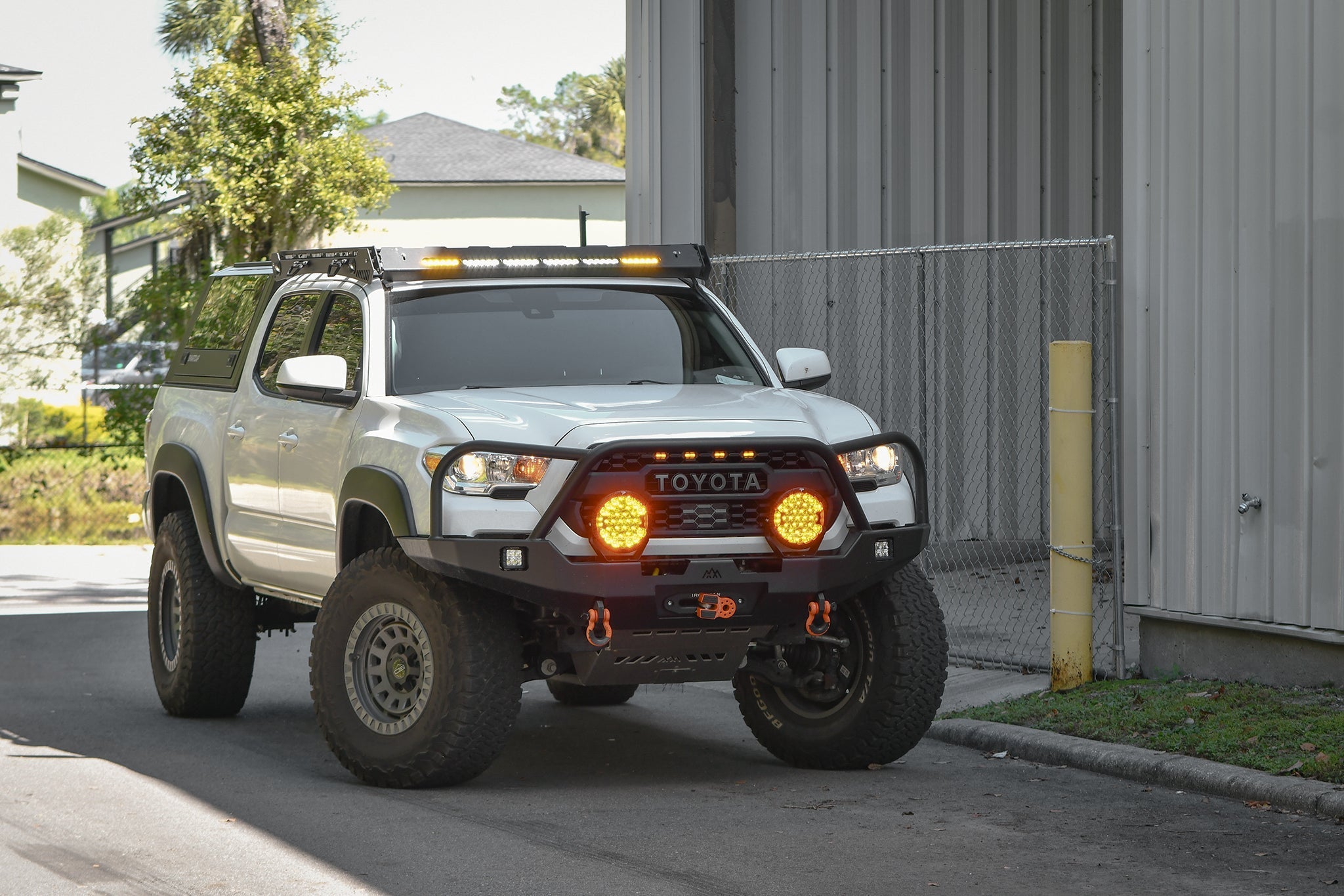 Overland Sector off-road gear and overlanding accessories arranged for product display.