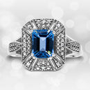 .925 Sterling Silver Diamond Accent and 8X6 mm Emerald-Shape Blue Topaz Ring (I-J Color, I2-I3 Clarity) - Ring Size 7-1