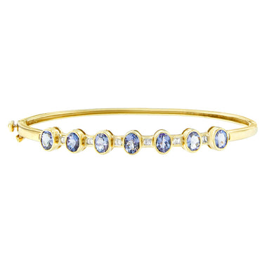 14K Yellow Gold Alternating Bezel Set 5MM Oval Shaped Tanzanite and 1/5 Cttw Diamond Bangle Bracelet (H-I Color, VS2-SI1 Clarity) - Fit's wrists up to 7.25" Inches