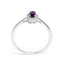 10K White Gold 5X3MM Oval Purple Amethyst and Diamond Accent Halo Ring (I-J Color, I1-I2 Clarity) - Ring Size 6.5-5