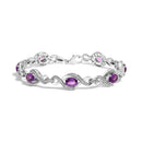 .925 Sterling Silver 1/10 Cttw Natural Round Diamond and 7X5MM Oval Amethyst Cross Tennis Bracelet (I-J Color, I1-I2 Clarity) - 7"-1