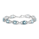 .925 Sterling Silver 7x7 mm Cushion Cut Blue Topaz and 1/20 cttw Round Cut Diamond Fashion Tennis Bracelet (I-J Color, I1-I2 Clarity) - 7"-6