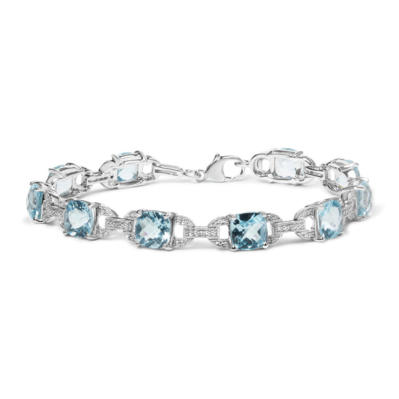.925 Sterling Silver 7x7 mm Cushion Cut Blue Topaz and 1/20 cttw Round Cut Diamond Fashion Tennis Bracelet (I-J Color, I1-I2 Clarity) - 7"
