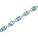 .925 Sterling Silver 7x7 mm Cushion Cut Blue Topaz and 1/20 cttw Round Cut Diamond Fashion Tennis Bracelet (I-J Color, I1-I2 Clarity) - 7"-9