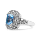 .925 Sterling Silver Diamond Accent and 8X6 mm Emerald-Shape Blue Topaz Ring (I-J Color, I2-I3 Clarity) - Ring Size 7-8