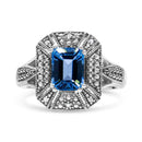 .925 Sterling Silver Diamond Accent and 8X6 mm Emerald-Shape Blue Topaz Ring (I-J Color, I2-I3 Clarity) - Ring Size 7-2