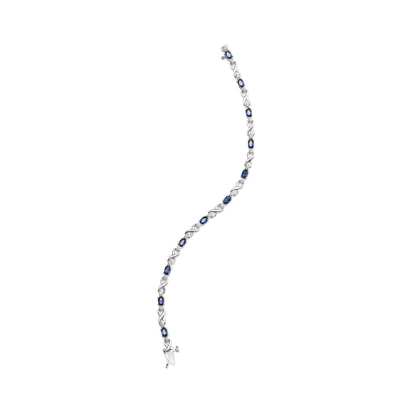 10K White Gold 5x4mm Oval Sapphire Gemstone and 1/10 Cttw Diamond Prong Set "X" Link Bracelet - Size 7" (H-I Color, SI1-SI2 Clarity)